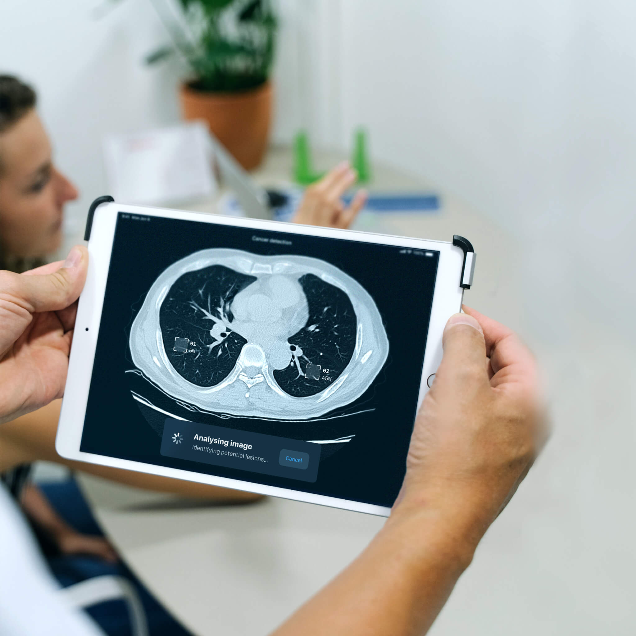 A photo showing medical software on a tablet that is analysing an MRI of a patients lung for signs of cancer lesions. This software could have been certified by Scarlet.